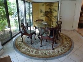Asian urn dining table, carved wood base, glass top 4 Southwood corner chairs