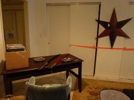 Amish metal star, reference books, swords