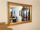 Large framed mirror.
