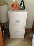 Metal filing cabinet.