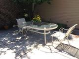 Glass patio table and chairs.