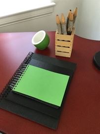 Black paper sketch books, colored pictures