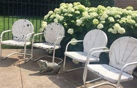 Set of four Vintage Metal Clamshell Chairs