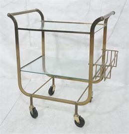 Lot 523 Italian style Rolling Solid Brass Bar Cart. Two l