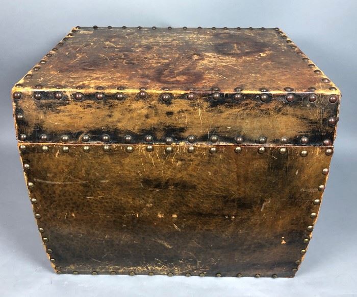 Lot 634 Leather Covered Storage Trunk. Metal tack studded