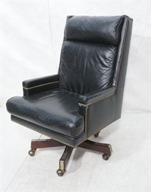 Lot 751 Tall Back Black Vinyl Rolling Office Chair. Brass