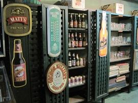 wall ads, Rolling Rock thermometer, cans & bottles