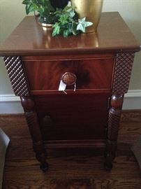 Detailed wooden one-drawer side table