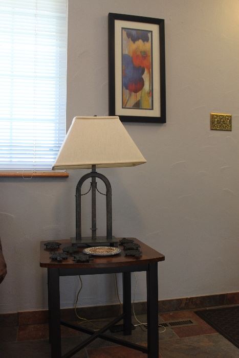 lamp, side table, and cast iron trivets