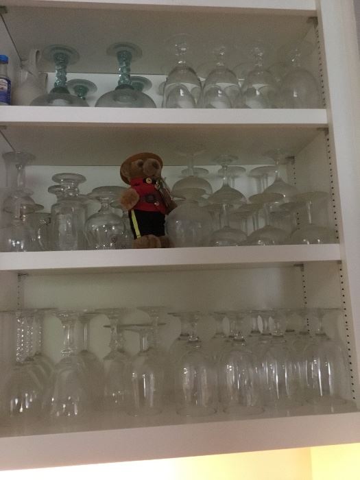 Vintage glassware guarded by a RC Mountie bear!