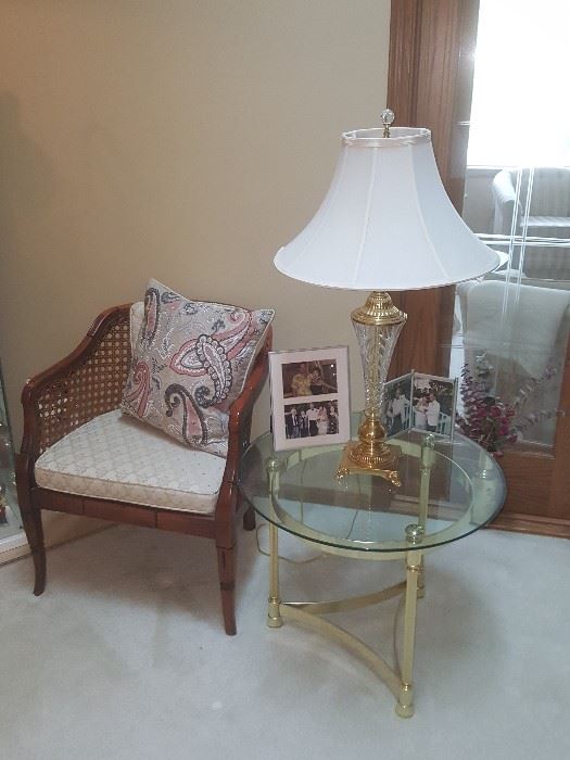 One of 2 side chairs and the other lamp and glass end table.