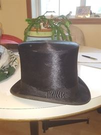 Top hat - beaver. Family members were told it belonged to Mr. Schuneman of Schuneman & Evans retail store in St. Paul.  Hat is in excellent condition and still has the original case.
