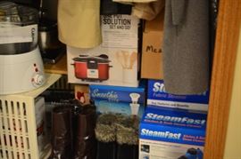 NIB items; grinder; vintage stainless mixing bowl (Back corner).