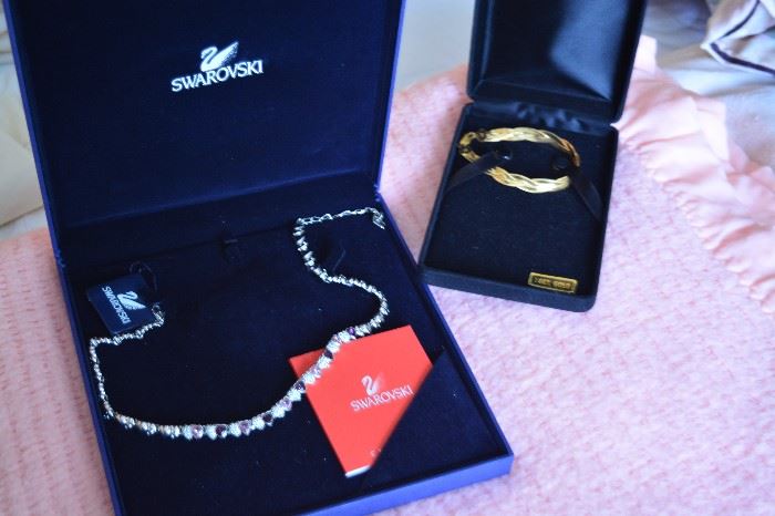 Swarovski necklace; 14k bracelet.