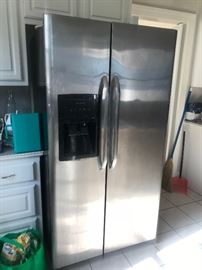 Side-by-side Frigidaire stainless refrigerator, less than 5 years old, excellent condition