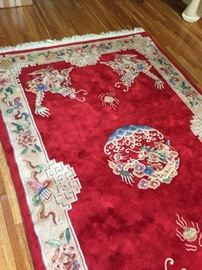 Beautiful cherry red rug purchased in China.