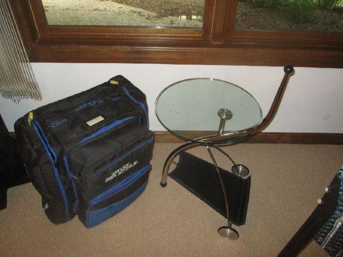 Glass top table and scuba diving equipment