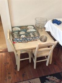 Child's tea set from Japan and child's play table and two chairs