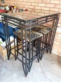 Snazzy patio bistro with leopard seat covers