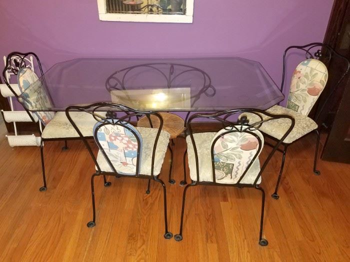 Glass table and four chairs