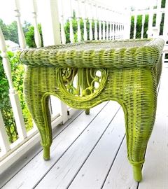 Bright green wicker patio table