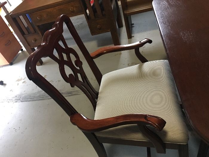 2 arm chairs and 4 padded chairs with table