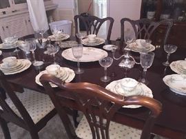 MAHOGANY DINING TABLE  AND 6 CHIPPENDALE STYLE DINING CHAIRS