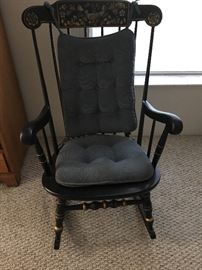 Black rocking chair with toll painting 