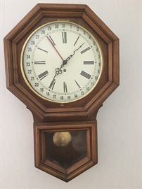 Wall clock with key
