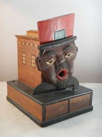 BLACK AMERICANA CIGARETTE DISPENSER