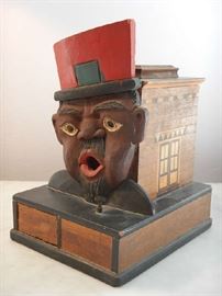 BLACK AMERICANA CIGARETTE DISPENSER