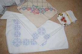 Cross stitch items, tablecloths and pillow cases