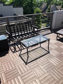 Outdoor patio furniture. On fourth floor rooftop deck.