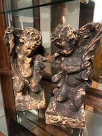 Pair of stone cherubs