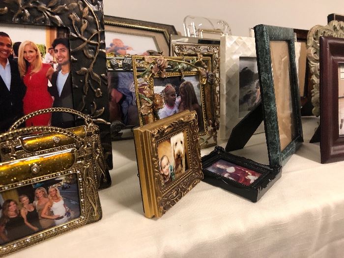 Assortment of more than 25 table top picture frames