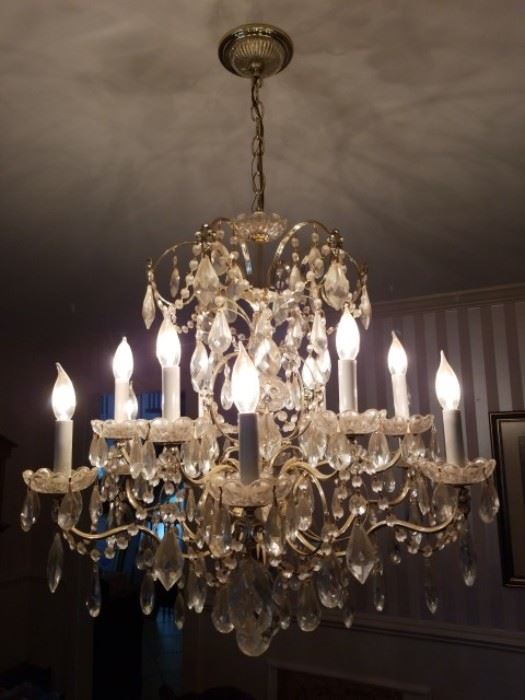 Picture 2 of Schonbek Chandelier     26" by 26"   gold tone metal with fleur de lis designs, faceted teardrops crystals, rosettes, crystal garland swags