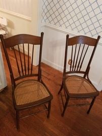 Pair Press back cane oak chairs    $185