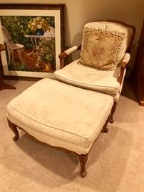 Upholstered down chair with matching ottoman
