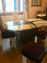 Marble top dining table & high back lacquer chairs 