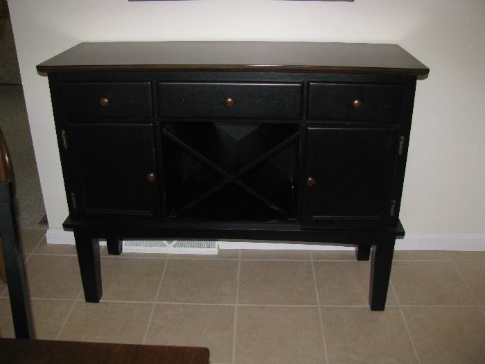 Side board with wine rack in the center