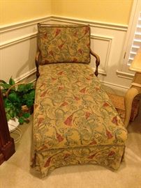 This antique lounge provides the perfect spot for naps or reading.  (fabric - as is)