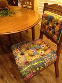 Brilliantly colored fabric on the Eastlake chairs