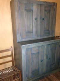 The chair and cupboard were made by workers on the Kay farm in Hawkins, Texas, in the mid- 1800's.