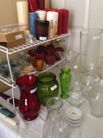 Many vases and candles