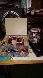 Buttons, antique sewing boxes with sewing notions