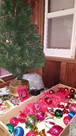 Vintage Christmas bulbs, lights, cookbooks and fiber-optic tree