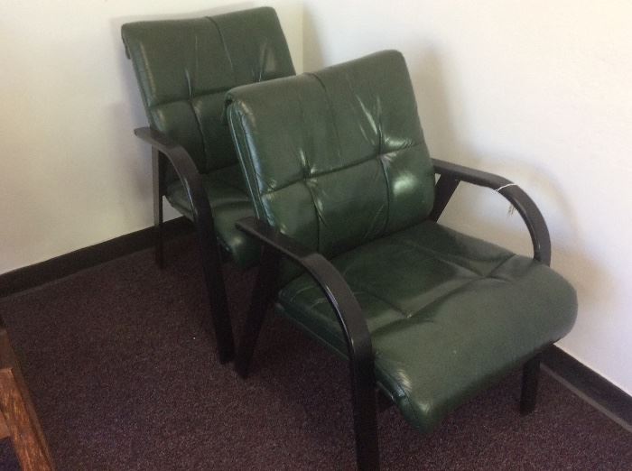 Green leather chairs