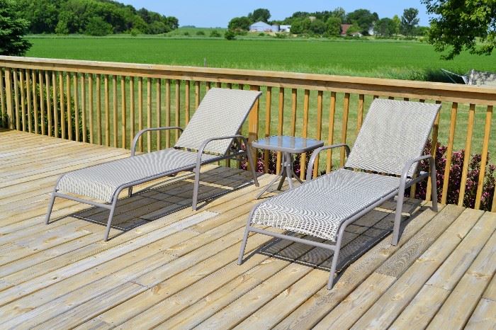 Outdoor lounge chairs with table (total of 4 chairs and 2 tables)