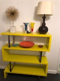 Imagine your own fun collection on this funky shelving unit!