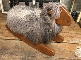 This vintage rocking sheep is sweet and even dated and signed